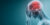 X-ray style image of human head and upper torso, highlighting brain in red, person holding head, suggesting headache or brain pain, medical concept